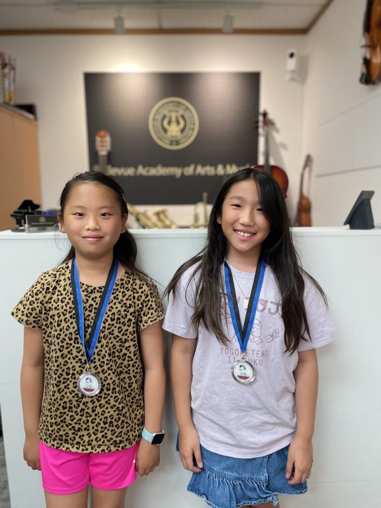 Anabelle and Sophie winning medal